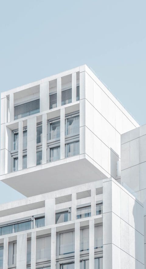 boxy white building with windows