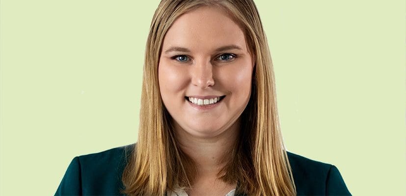 Woman headshot with green background